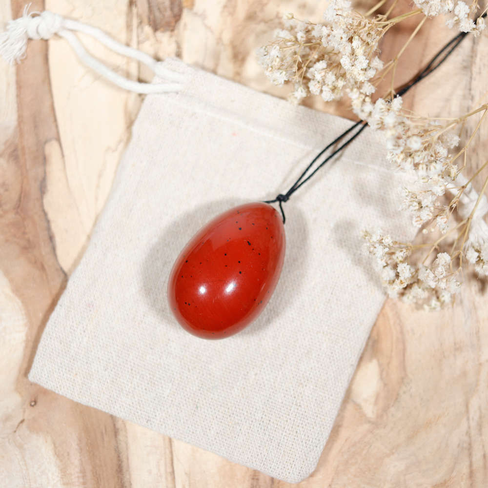 Œuf de yoni percé en jaspe rouge, grand modèle (4,5 cm sur 3 cm)pe rouge, grand modèle